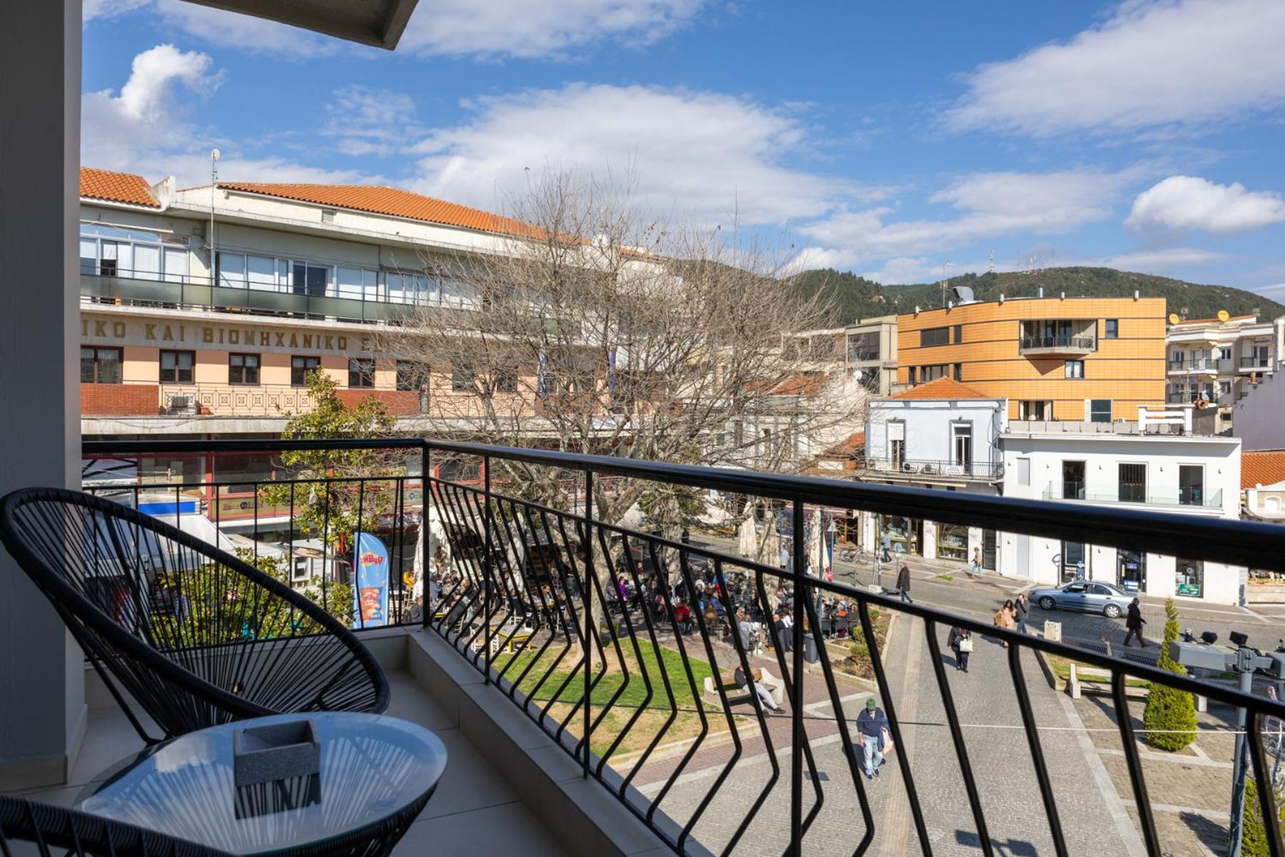 Clock Central Stay Xanthi Rum bild